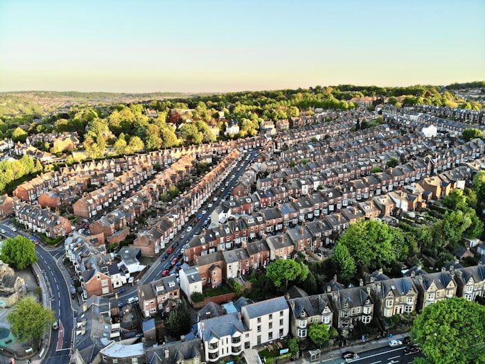 Aerial view of UK housing representing capital gains tax on property