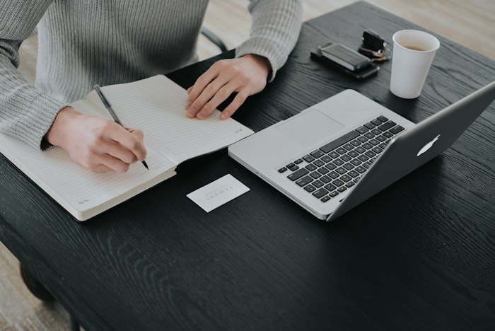 Person reviewing self assessment tax documents
